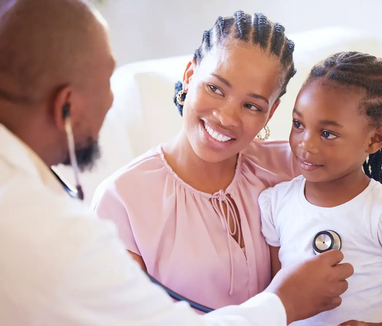 DHA licensed doctor providing multilingual care to mother and child at home