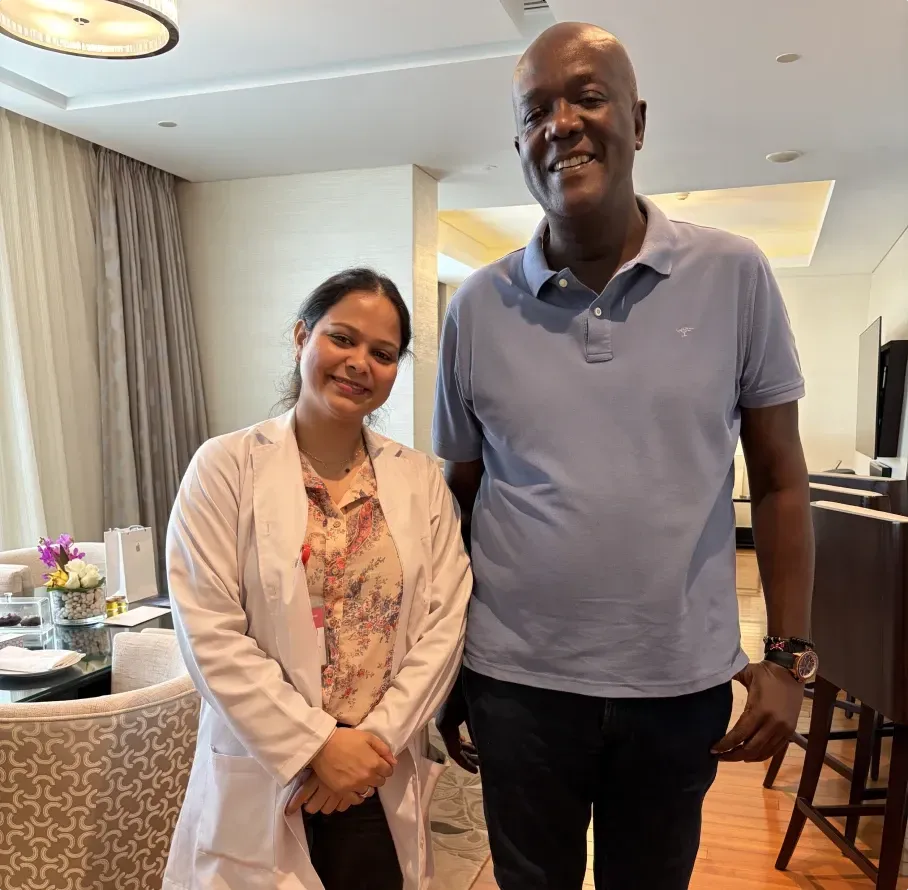 Doctor visiting patient at home for medical consultation in Dubai