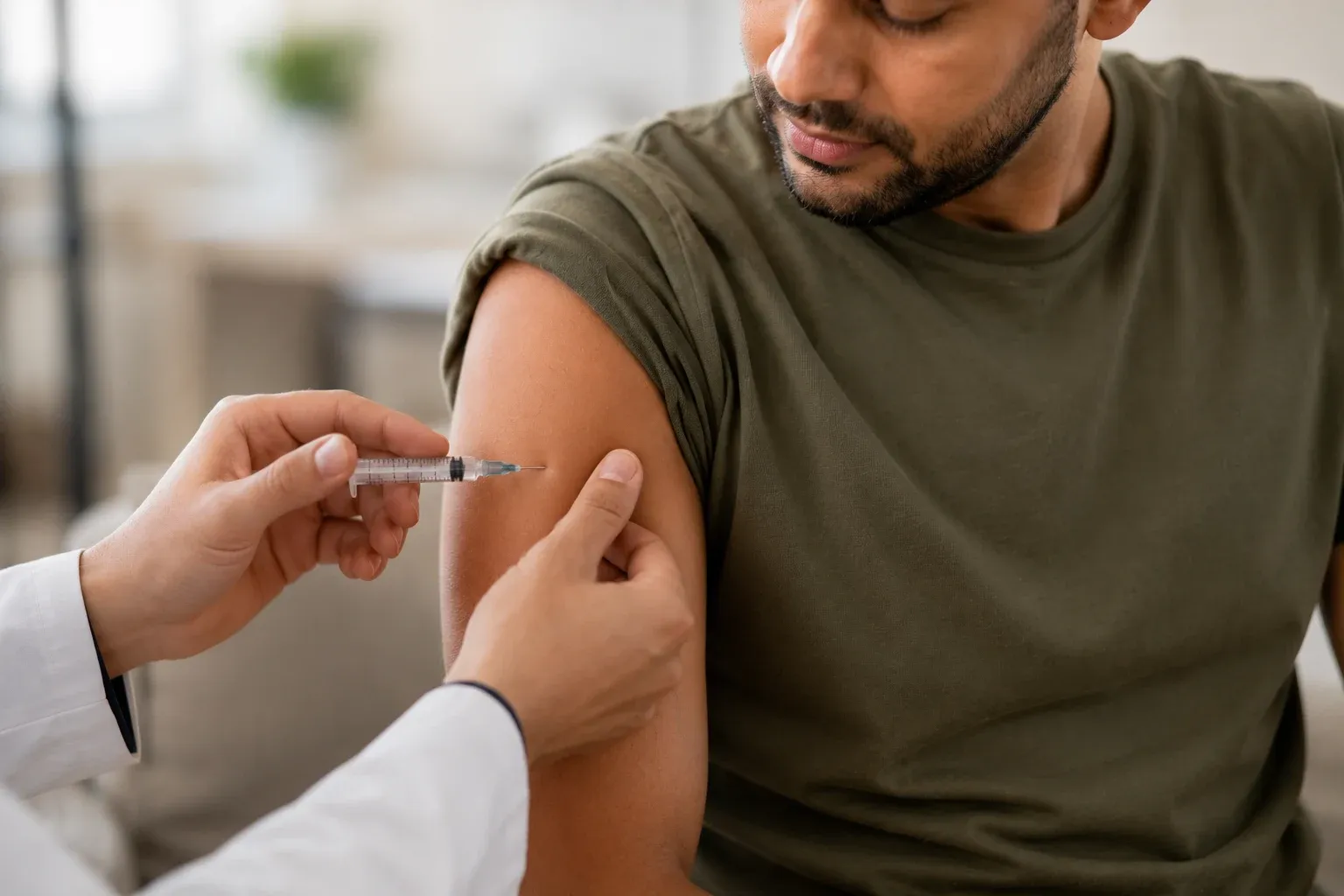 Adult receiving injection at home